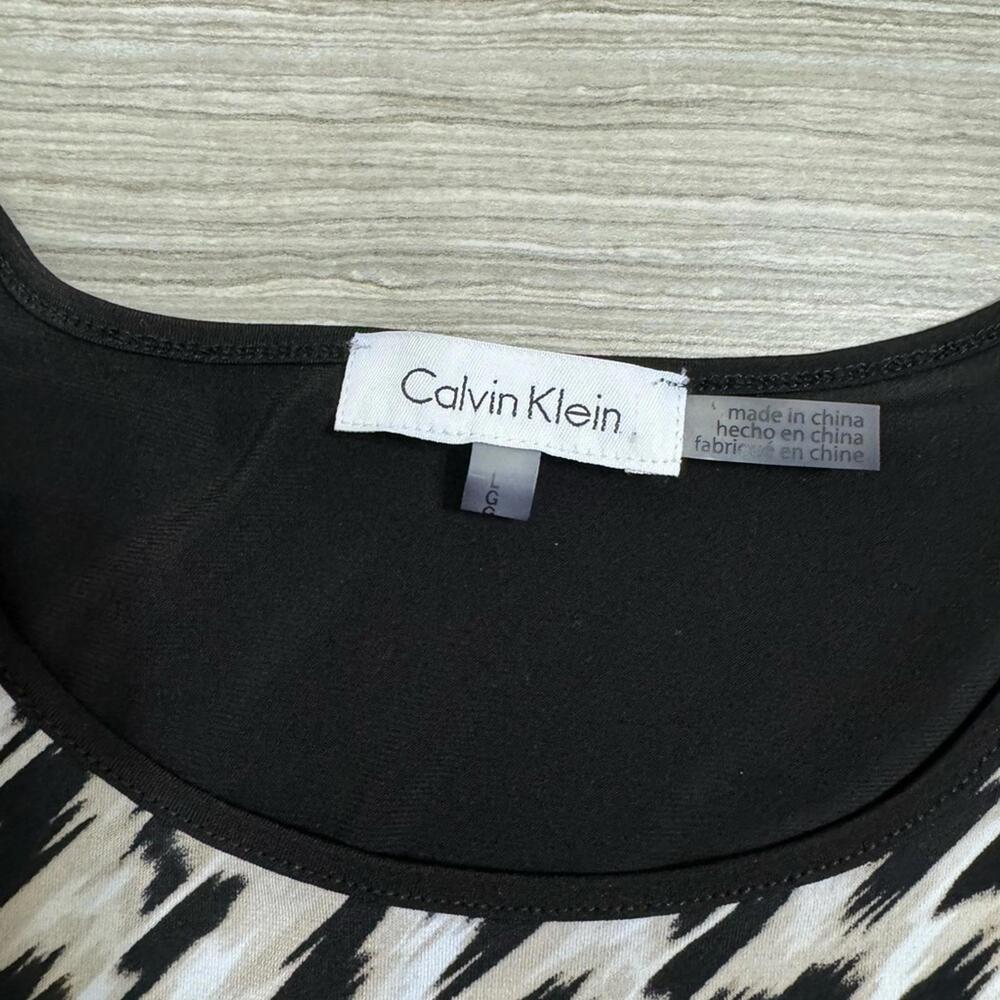 {SOLD}Calvin Klein Black Brown Printed Front Pocket Short Sleeve Top- Size large - Picture 5 of 6